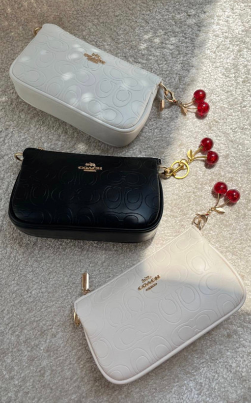 کیف دخترانه دوشی پاسپورتی طرح کوچ (Coach) جنس چرم مصنوعی خارجی