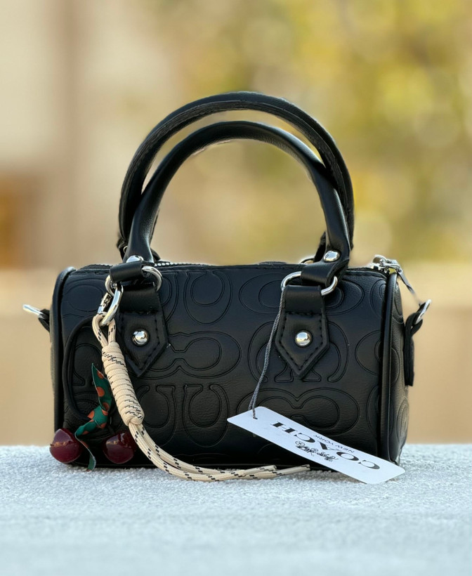 کیف دخترانه دستی / دوشی مدل صندوقی جنس چرم مصنوعی طرح کوچ (Coach)