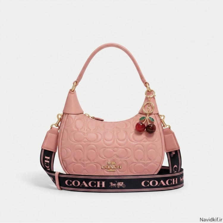 کیف دخترانه دستی / دوشی مدل نیمگرد جنس چرم مصنوعی طرح کوچ (Coach)