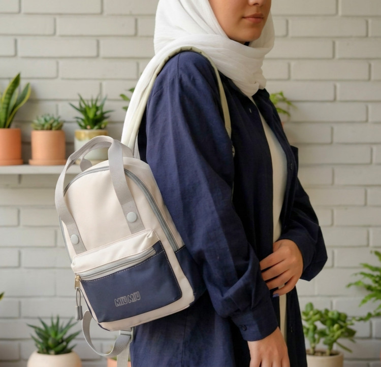 کوله پشتی فانتزی مدل دکمهدار جنس پارچهای وارداتی