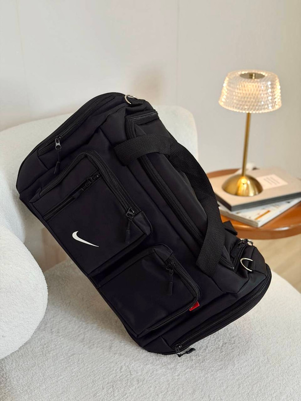 ساک ورزشی مدل جلو دو جیب جنس پارچه برزنت خارجی طرح نایک Nike
