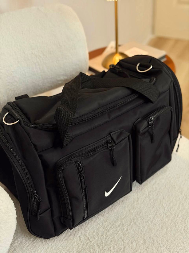 ساک ورزشی مدل جلو دو جیب جنس پارچه برزنت خارجی طرح نایک Nike